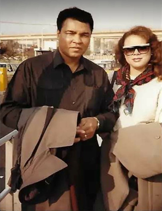 Muhammad Ali and Woman Beside
